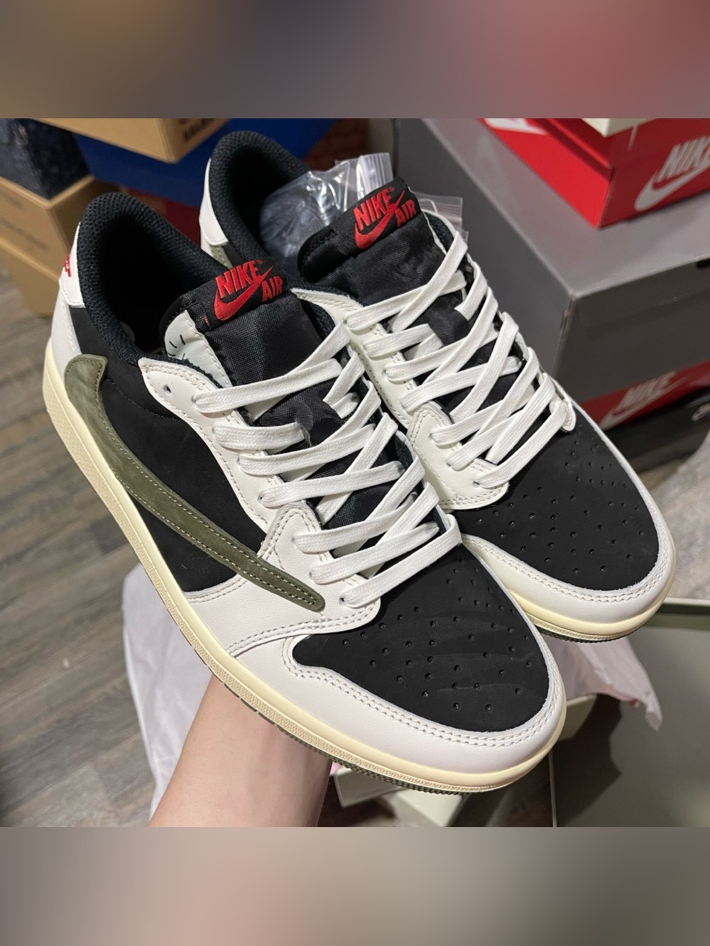 Travis Scott x Air Jordan 1 Low Olive Reverse Swoosh Sneakers